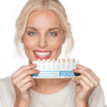 Woman Holding Pola Teeth Whitening Gel Shade Guide